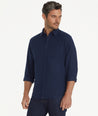 Model is wearing UNTUCKit Flannel Sherwood Shirt in dark navy.