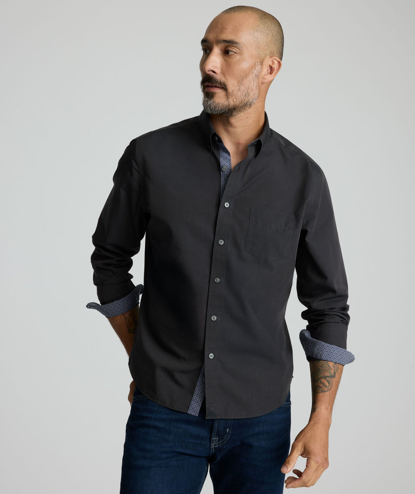 Model is waring UNTUCKit Siermer wrinkle-free shirt.