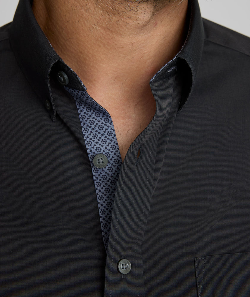 Model is waring UNTUCKit Siermer wrinkle-free shirt.