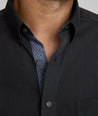 Model is waring UNTUCKit Siermer wrinkle-free shirt.