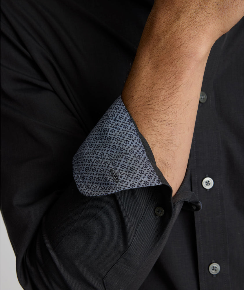 Model is waring UNTUCKit Siermer wrinkle-free shirt.