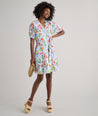 Model is wearing UNTUCKit Sierra dress in fruit print.