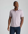 Model is wearing UNTUCKit Textured Performance Polo in fig. 