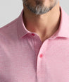 Model is wearing UNTUCKit Textured Performance Polo	in Red.