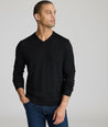 Model is wearing UNTUCKit sweater in black.