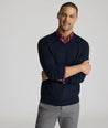 Model is wearing UNTUCKit sweater in navy.