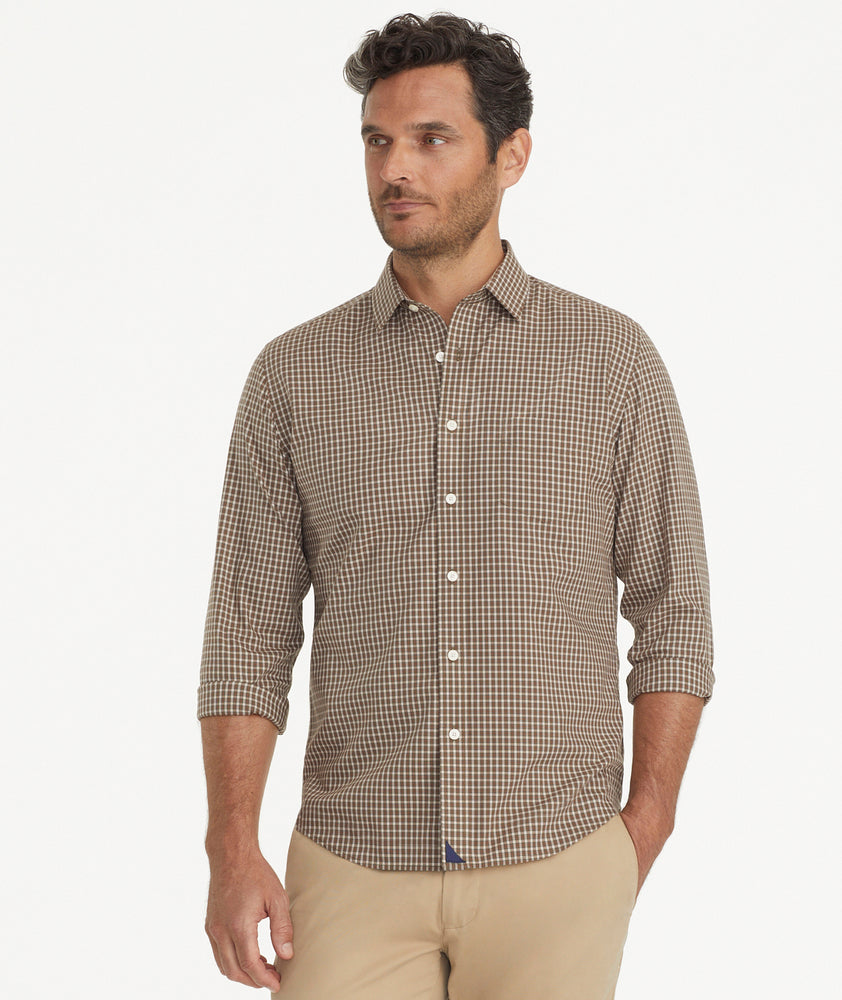 Model is wearing UNTUCKit Wrinkle-Free Steffon Shirt in Small Beech Check.