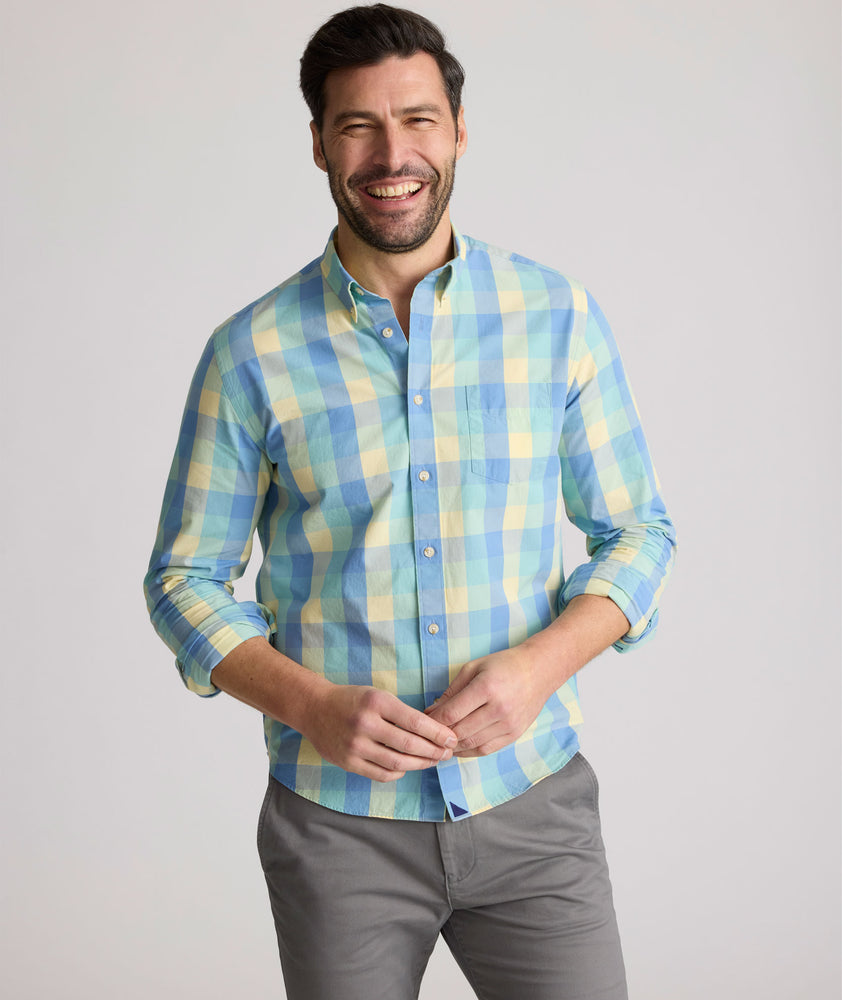 Model is wearing UNTUCKit Stratford vintage wash in plaid yellow. 