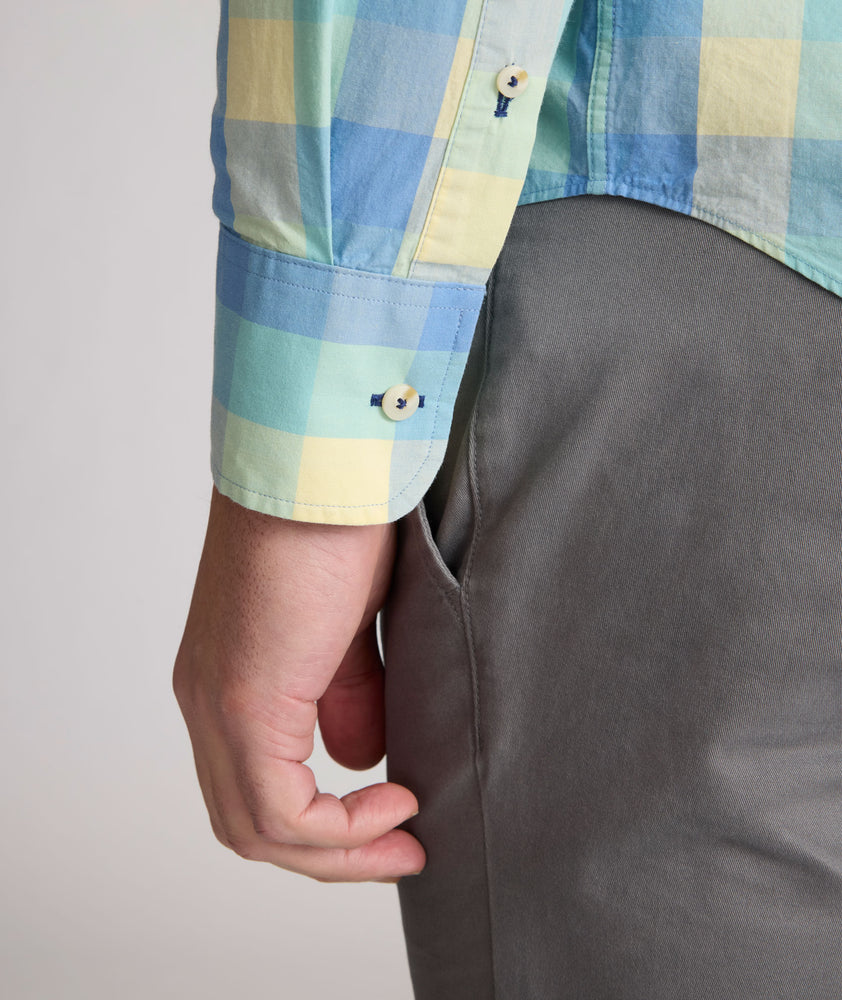 Model is wearing UNTUCKit Stratford vintage wash in plaid yellow. 