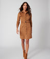 Model is wearing UNTUCKit brown Talia Dress.