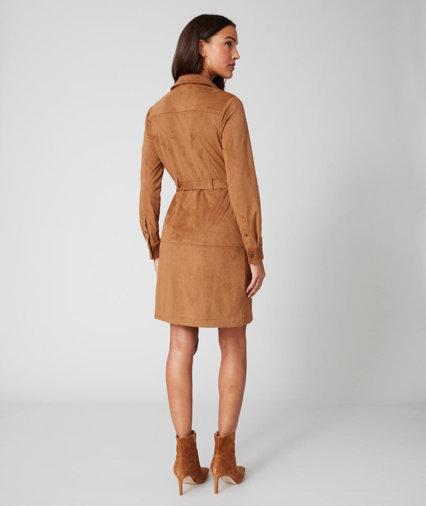 Model is wearing UNTUCKit brown Talia Dress.