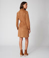 Model is wearing UNTUCKit brown Talia Dress.