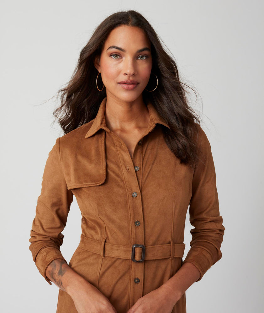 Model is wearing UNTUCKit brown Talia Dress.
