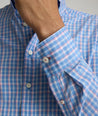 Model is wearing UNTUCKit Wrinkle-Free Thorne Shirt in blue.