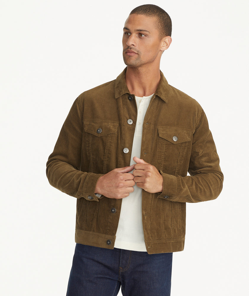 Model is wearing UNTUCKit Corduroy Reid Jacket in tan.