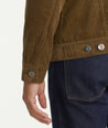 Model is wearing UNTUCKit Corduroy Reid Jacket in tan.