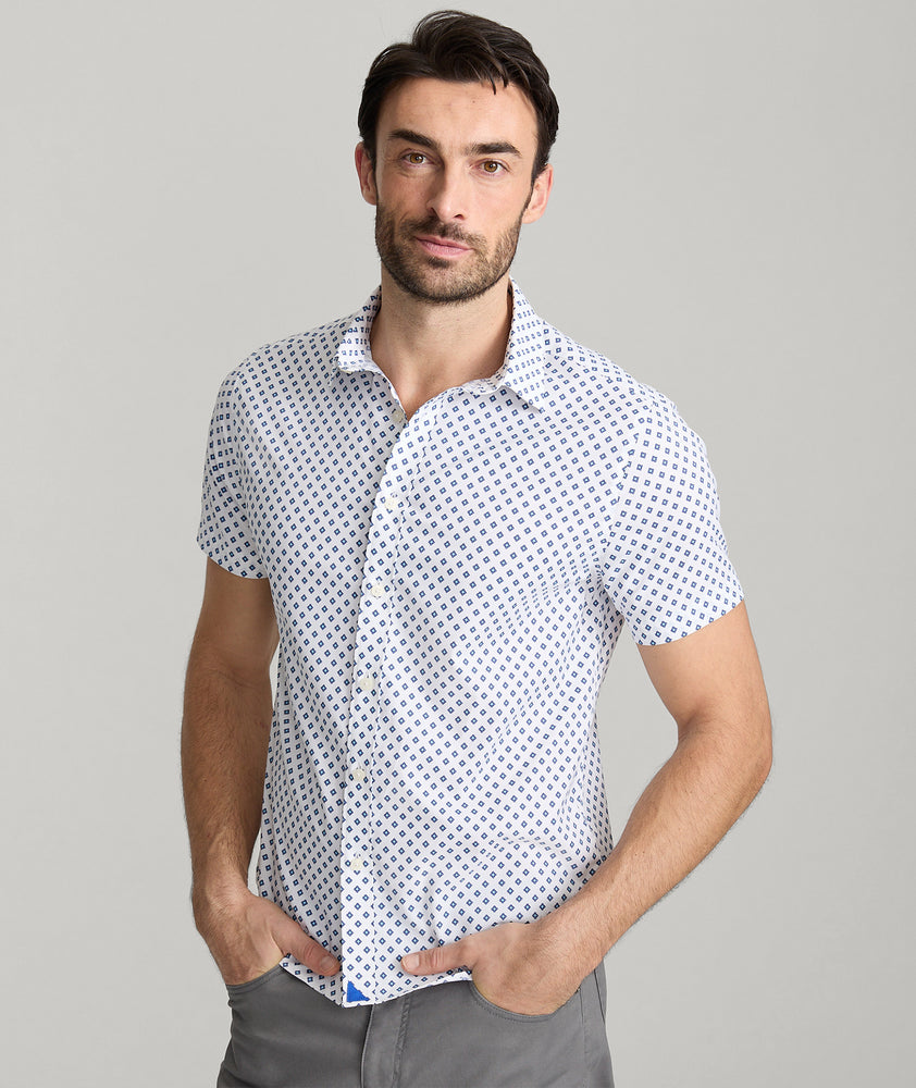 Model is wearing UNTUCKit Tidwell performance shirt. 