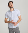 Model is wearing UNTUCKit Tidwell performance shirt. 