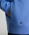 Model is wearing UNTUCKit Toovy Performance Quarter Zip in Blue yonder.