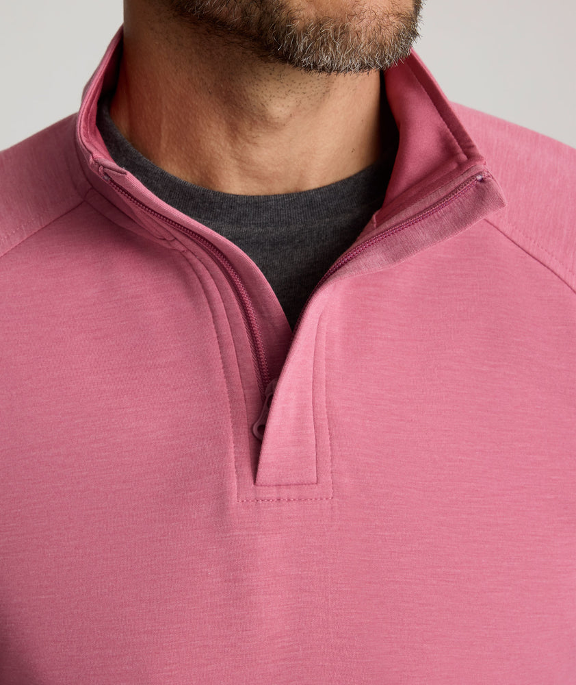 Model is wearing UNTUCKIt Toovy Performance Quarter Zip in Rose Wine.