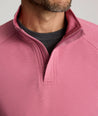 Model is wearing UNTUCKIt Toovy Performance Quarter Zip in Rose Wine.
