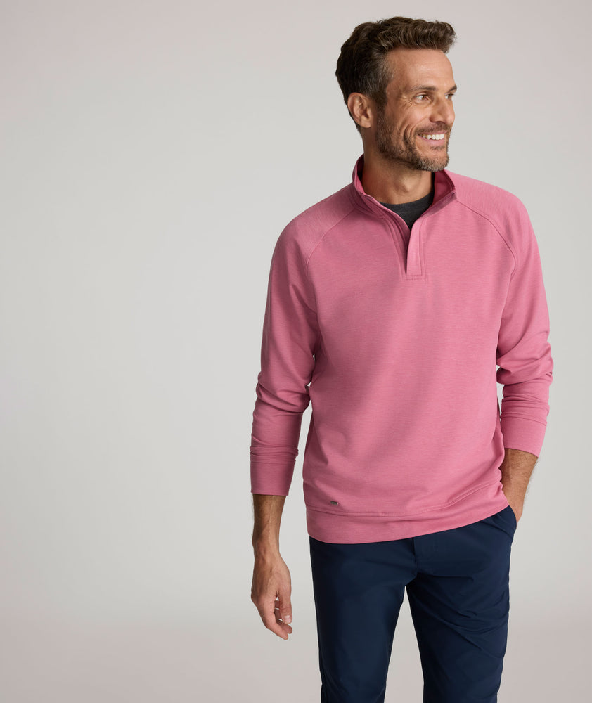 Model is wearing UNTUCKIt Toovy Performance Quarter Zip in Rose Wine.