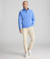 Model is wearing UNTUCKit 5-Pocket Performance Tech Pants in Tan.