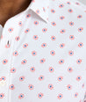 Model is wearing UNTUCKit short sleeve Truesdale in printed red. 