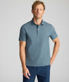 Model is wearing UNTUCKit Printed CottonTek™ Polo Blue Print. 