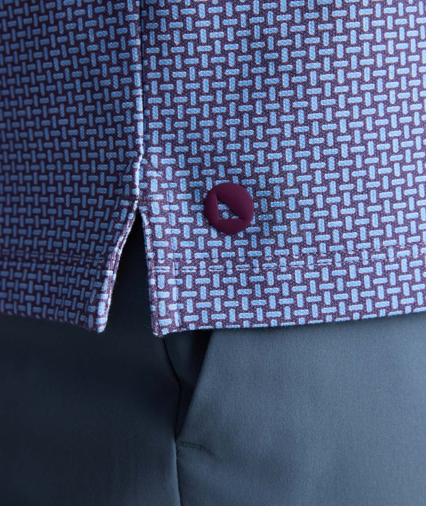 Model is wearing UNTUCKit Printed CottonTek™ Polo Blue Print. 