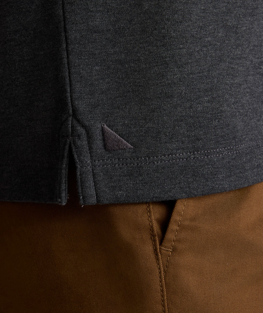 Model is wearing UNTUCKit Vargas WF Polo in Heather charcoal.