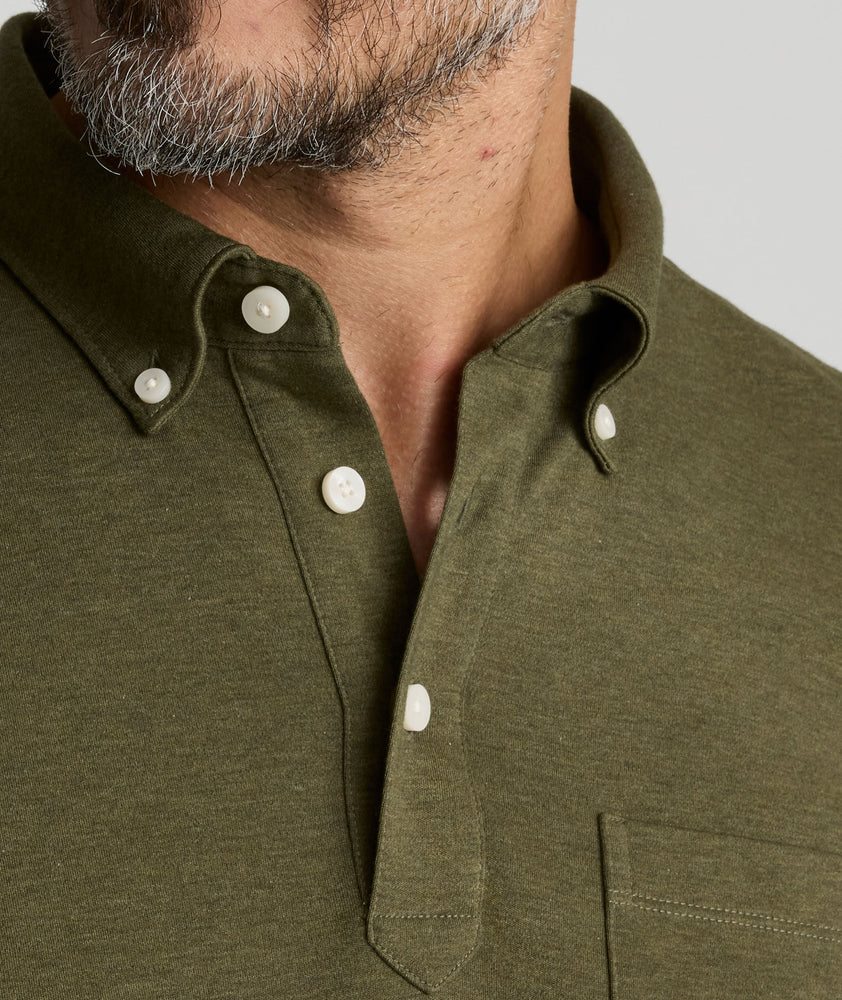 Model is wearing UNTUCKit Vargas WF Polo in Heather Olive.