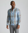 Model is wearing UNTUCKit Wrinkle-Resistant Linen Vaughn Shirt. 