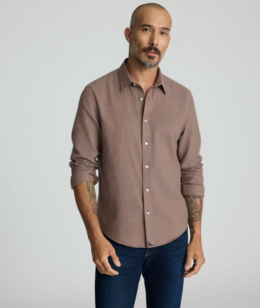 Model is wearing UNTUCKit Veneto wrinkle-free shirt. 