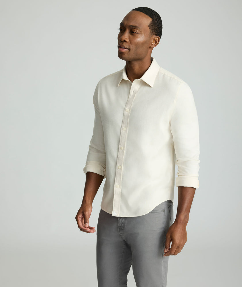 Model is wearing UNTUCKit Wrinkle-Free Veneto Shirt in egret.