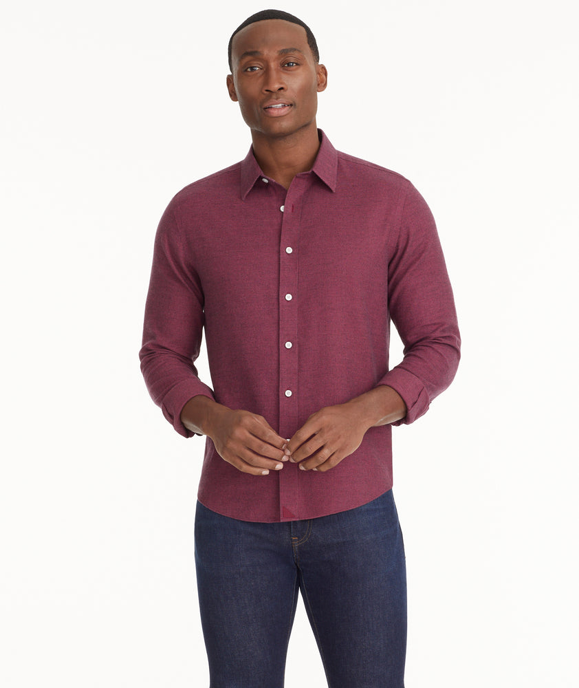 Model is wearing UNTUCKIt Wrinkle-Free Veneto Shirt in dark berry.