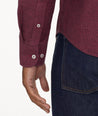 Model is wearing UNTUCKIt Wrinkle-Free Veneto Shirt in dark berry.