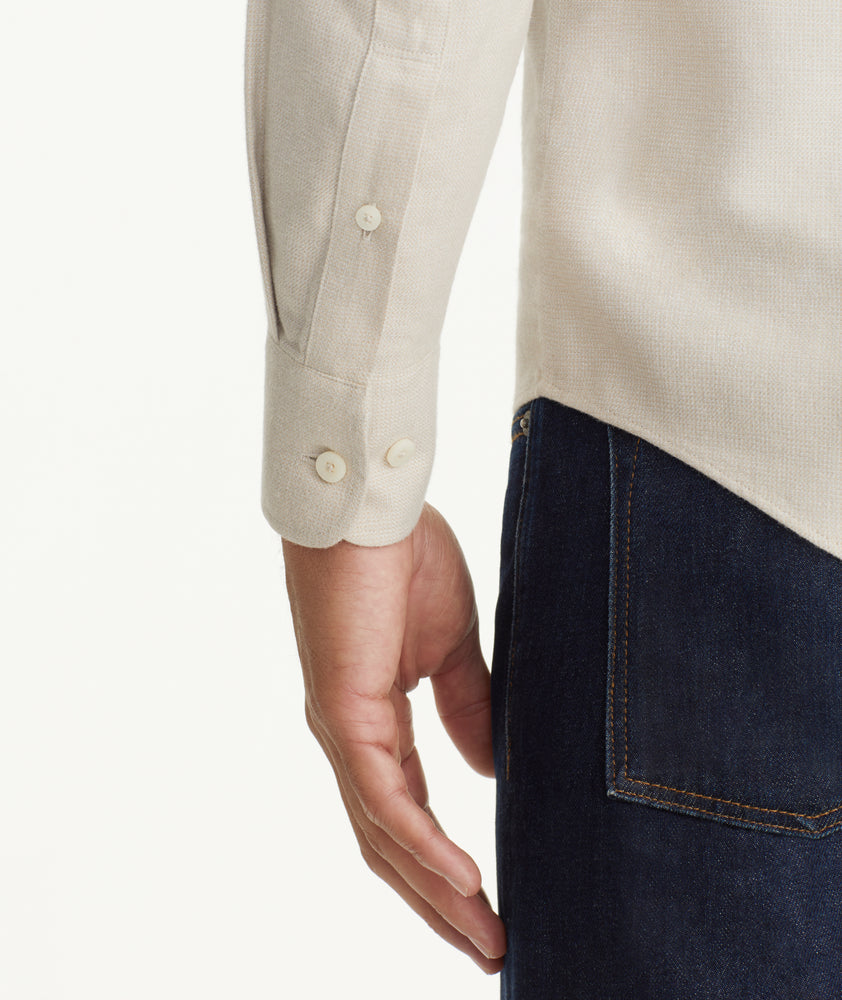 Model is wearing UNTUCKit Wrinkle-Free Veneto Shirt in Textured Light Tan.