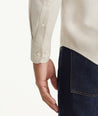 Model is wearing UNTUCKit Wrinkle-Free Veneto Shirt in Textured Light Tan.