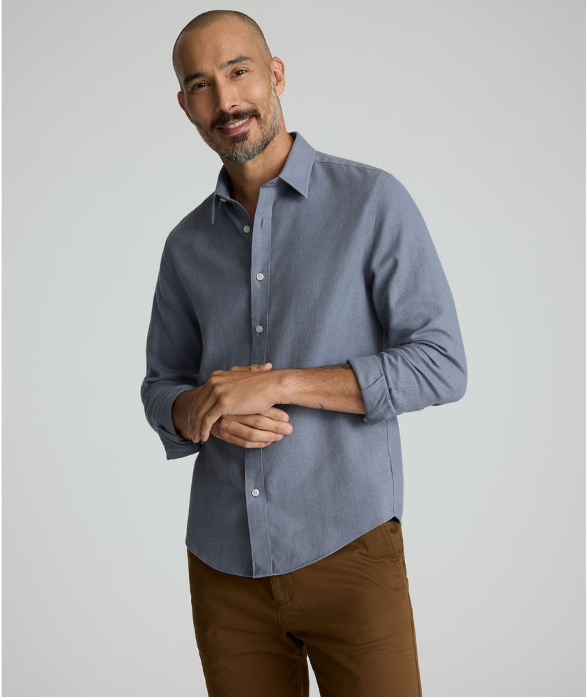 Model is wearing UNTUCKit Veneto wrinkle-free shirt. 