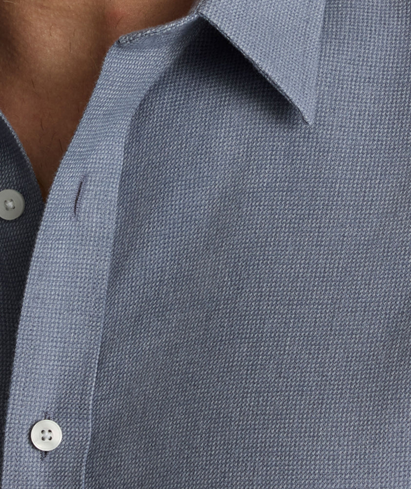 Model is wearing UNTUCKit Veneto wrinkle-free shirt. 