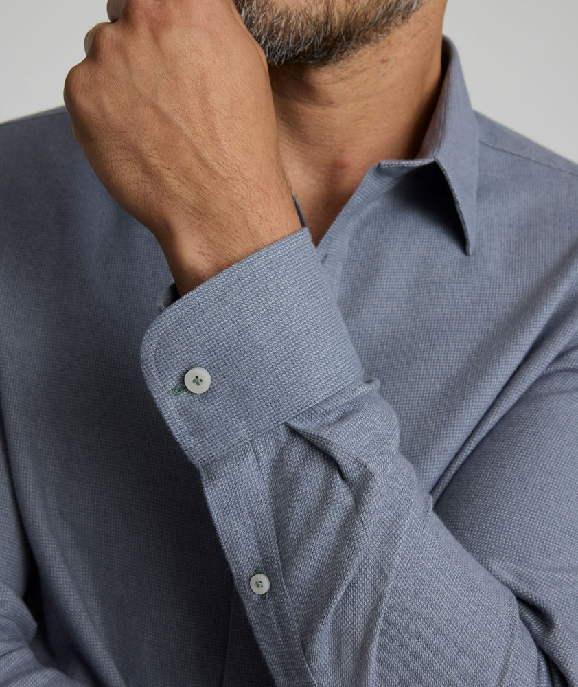 Model is wearing UNTUCKit Veneto wrinkle-free shirt. 