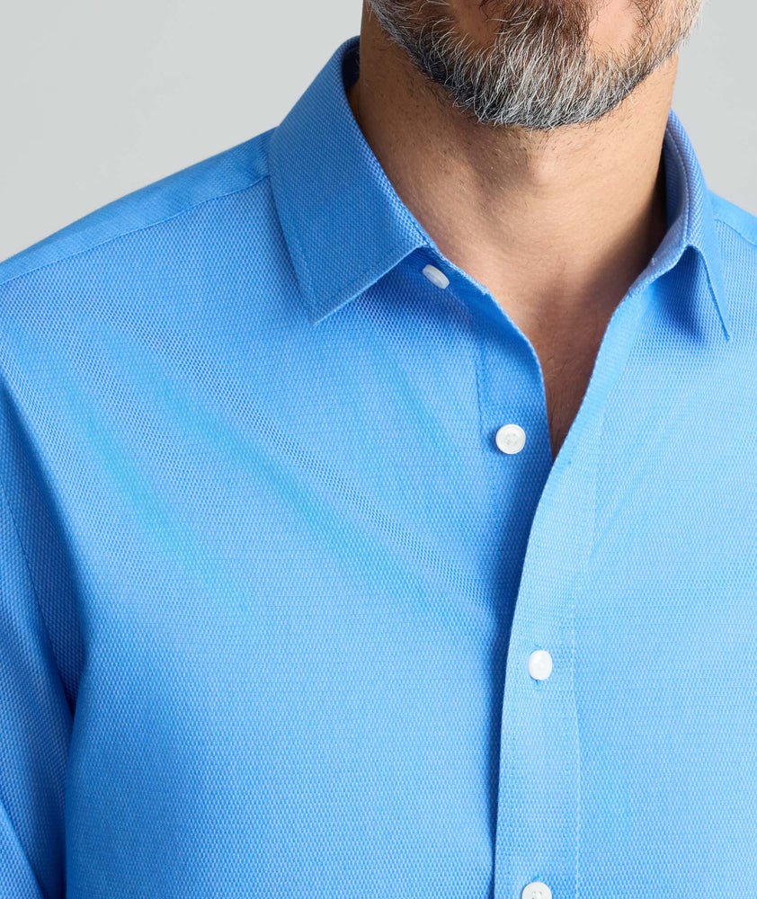 Model is wearing UNTUCKit Wrinkle-Free Vidal Shirt. 