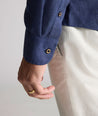 Model wearing an UNTUCKit Navy Wrinkle-Resistant Linen Vin Santo Shirt
