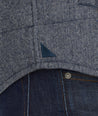 Model is wearing UNTUCKit Vinifera jacket in navy.