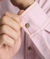 Model is wearing UNTUCKit Vintage Wash Western Shirt in pink.