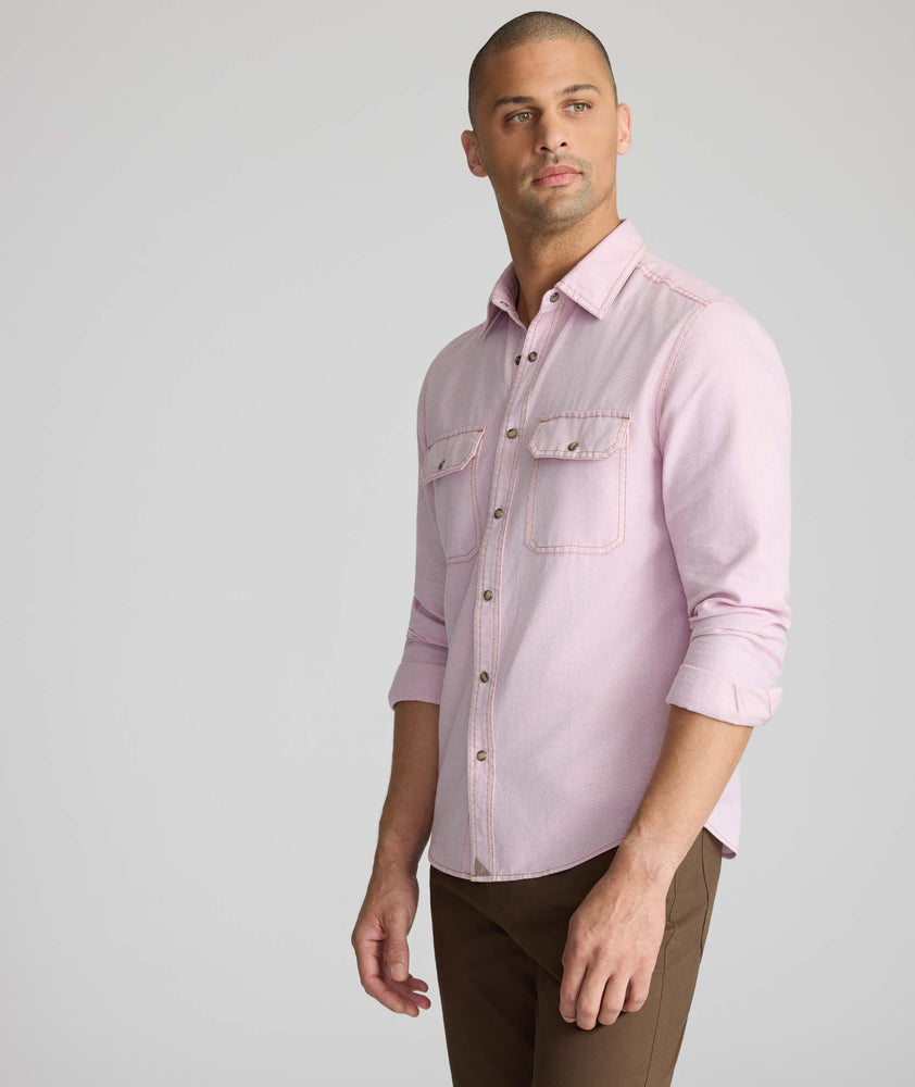 Model is wearing UNTUCKit Vintage Wash Western Shirt in pink.