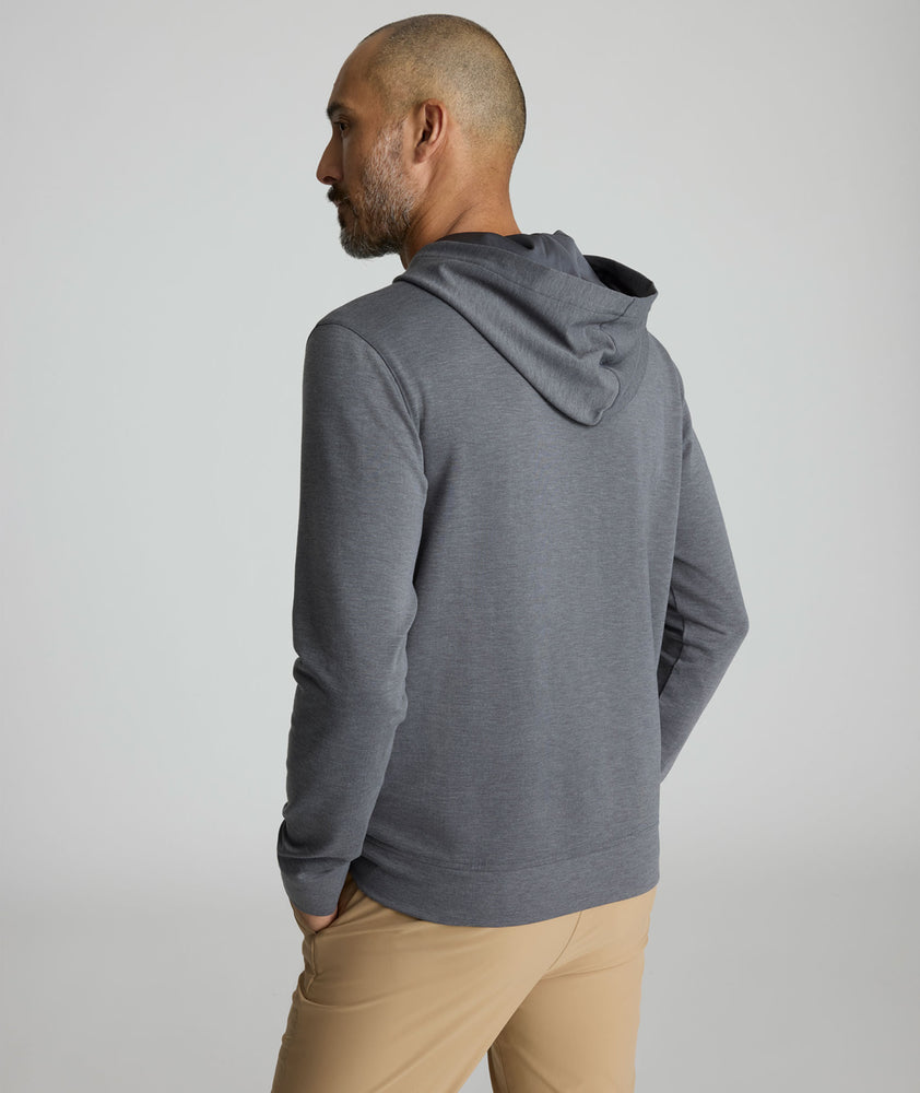 Model is wearing UNTUCKit weatherby performance hoodie. 