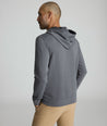 Model is wearing UNTUCKit weatherby performance hoodie. 