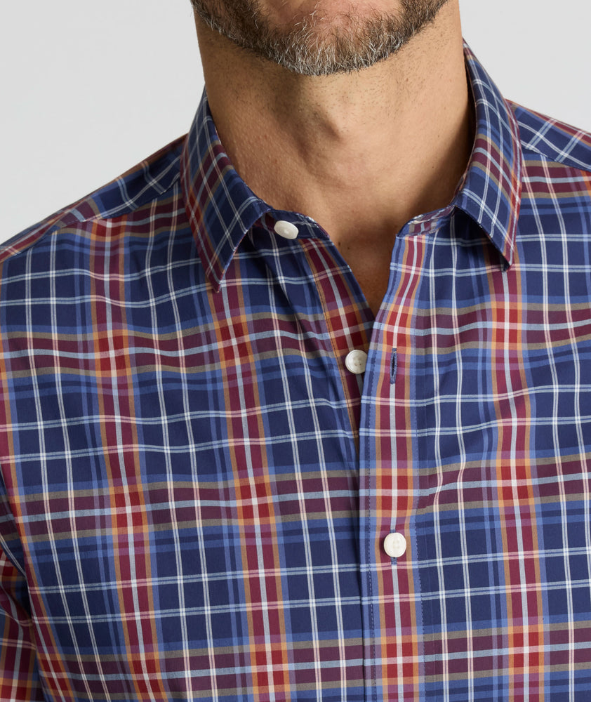 Model is wearing UNTUCkit CottonTek Wiess Shirt. 